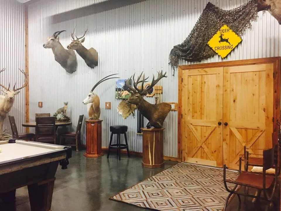 Rustic Industrial Man Cave and Hunting Garage by Corrales Decor - Photo 4