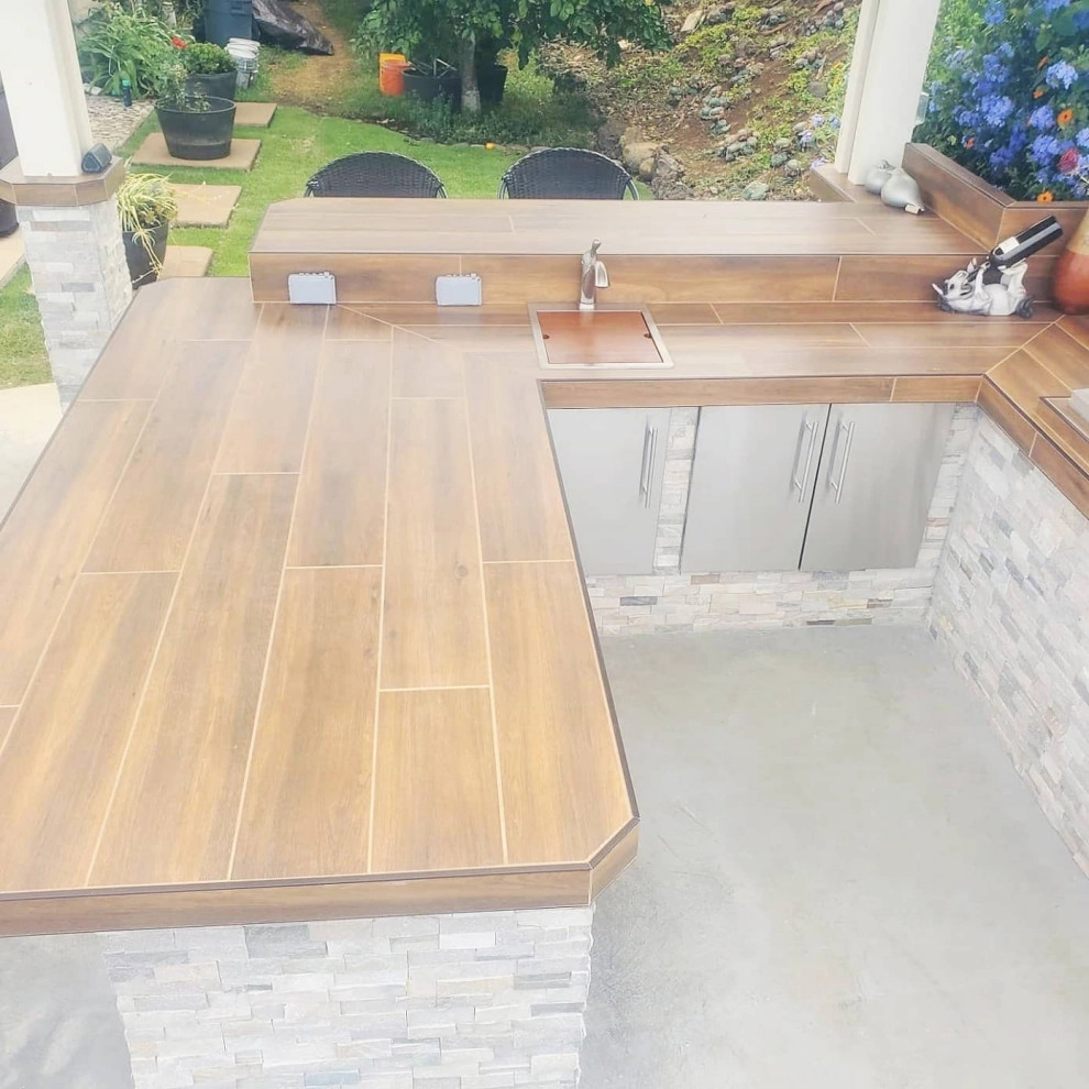 outdoor kitchen design and installation by Natur Landscape Creations - Photo 3