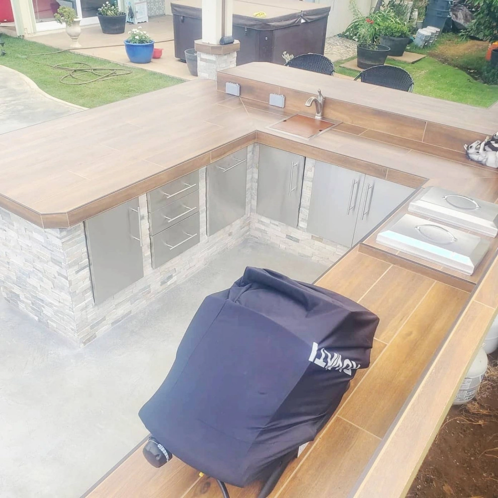 outdoor kitchen design and installation by Natur Landscape Creations - Photo 19