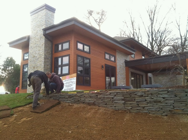 Planting on hills to control erosion by NY Plantings Irrigation And Landscape Lighting - Photo 2