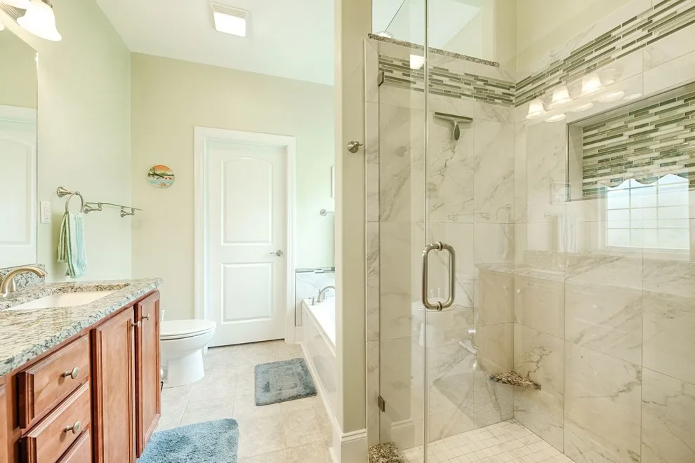 Shower and Tub Tile Surround by First Choice Home Remodeling - Photo 4