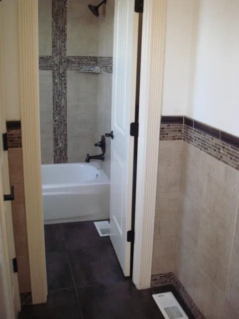 Bathroom Renovation for Transitioning Spaces by Mark Hammer Construction LTD. - Photo 3