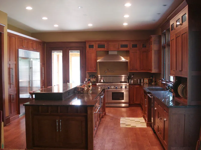 Industrial-Inspired Traditional Kitchen by Primo J W Skutnik Custom Builder Inc - Photo 4