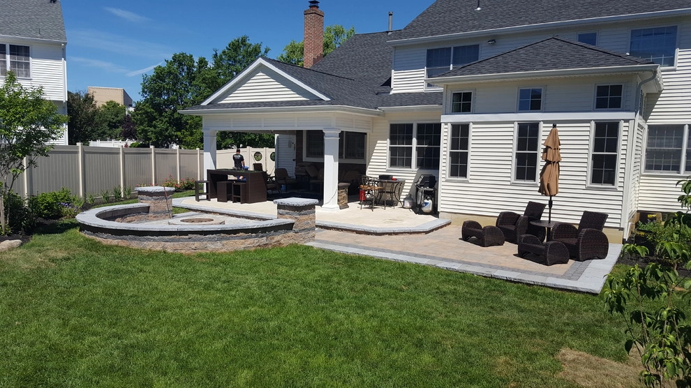 Techo-Bloc Patio Firepit Landscape, Seat wall, Landscape Lighting, Front Entry by Paradise Pavers Pond Landscaping LLC - Photo 7