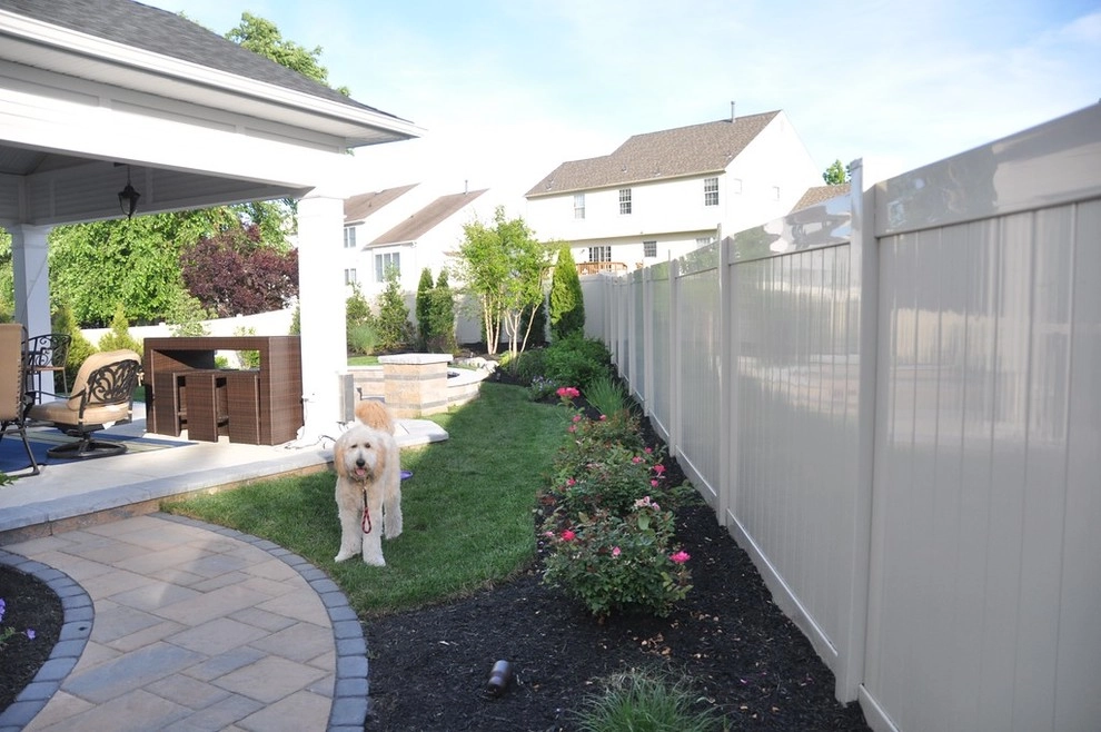 Techo-Bloc Patio Firepit Landscape, Seat wall, Landscape Lighting, Front Entry by Paradise Pavers Pond Landscaping LLC - Photo 4