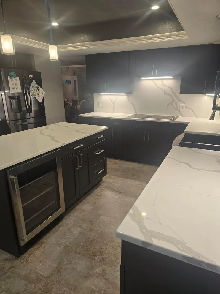 Light Stone and Dark Cabinetry by Level Up Construction & Investment Group LLC - Photo 2