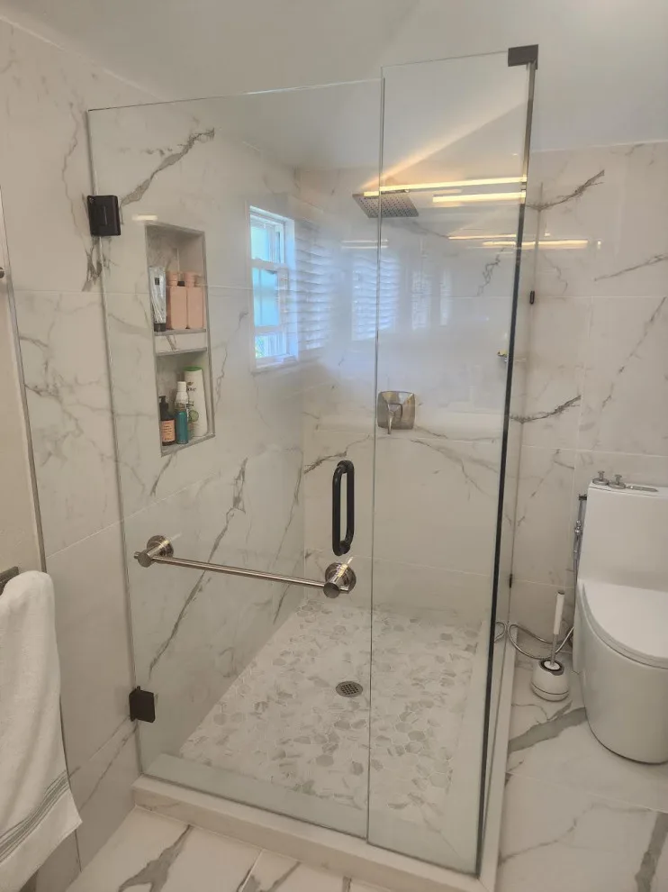 Marble White Bathroom Renovation by Level Up Construction & Investment Group LLC - Photo 4