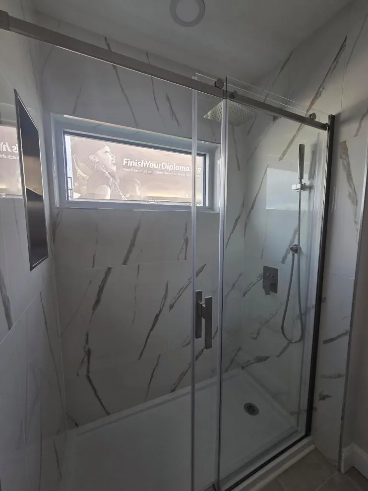 Marble White Bathroom Renovation by Level Up Construction & Investment Group LLC - Photo 2