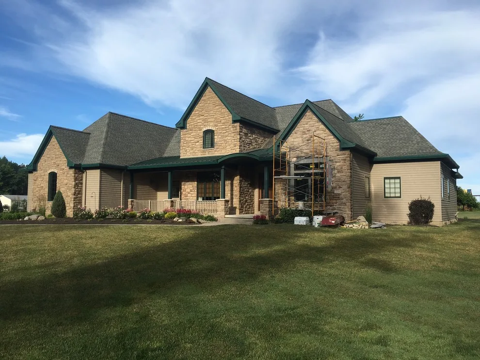 Window, Siding, and Stone Installation by DBC Remodeling & Construction LLC - Photo 3