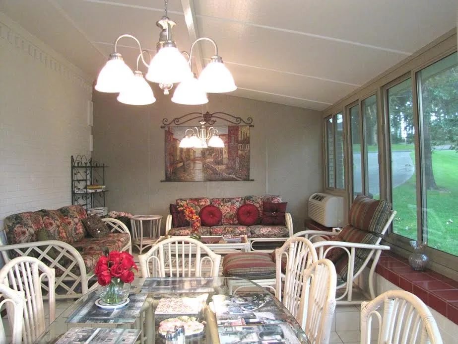 Outdoor Sunrooms and Enclosures by Gutters And More Construction LAF - Photo 20