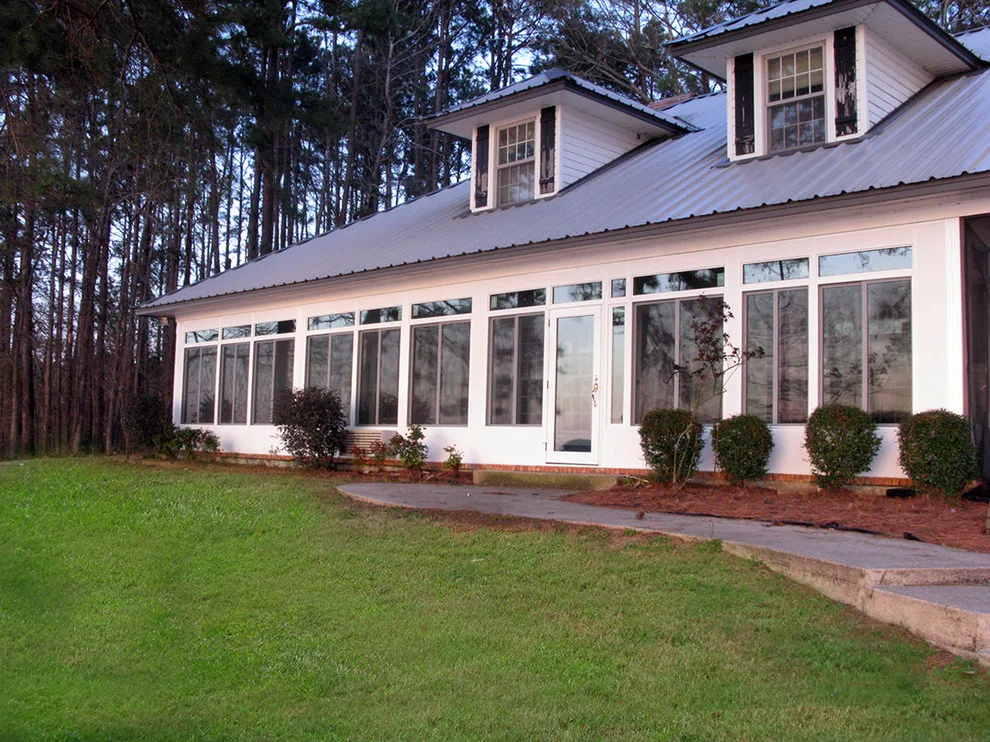Outdoor Sunrooms and Enclosures by Gutters And More Construction LAF - Photo 12