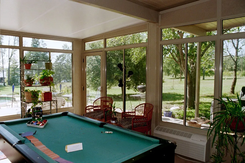 Outdoor Sunrooms and Enclosures by Gutters And More Construction LAF - Photo 17