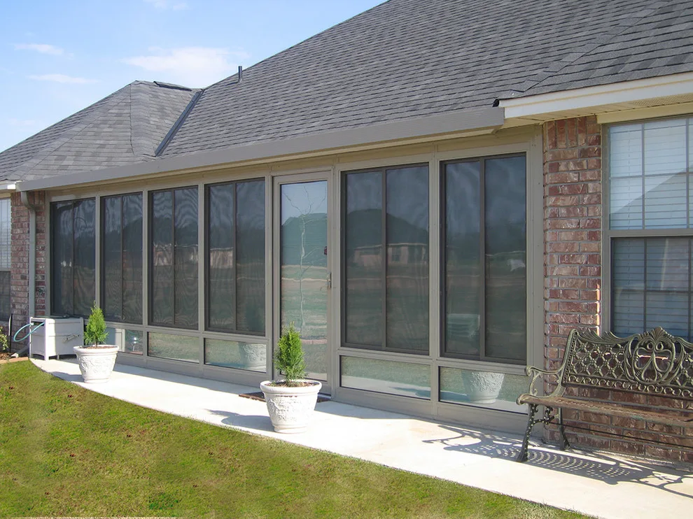 Outdoor Sunrooms and Enclosures by Gutters And More Construction LAF - Photo 21