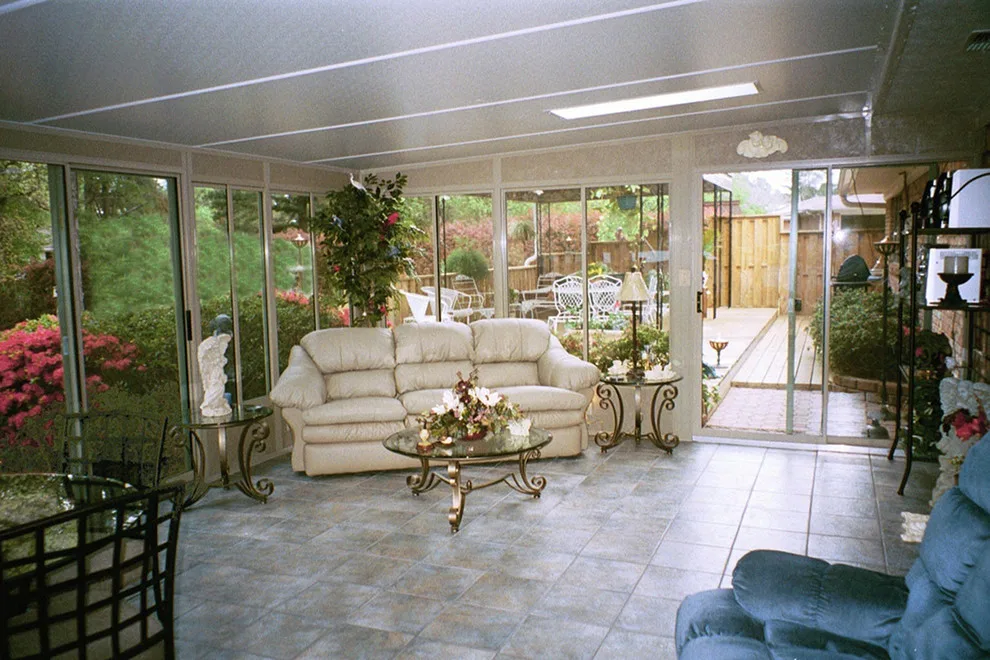 Outdoor Sunrooms and Enclosures by Gutters And More Construction LAF - Photo 25