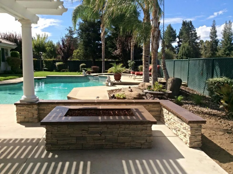 Exterior Fire Pits by Sunset Construction & Design - Photo 19