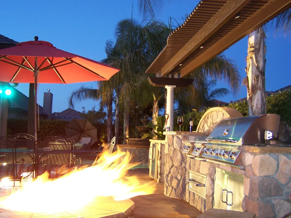 Exterior Fire Pits by Sunset Construction & Design - Photo 8