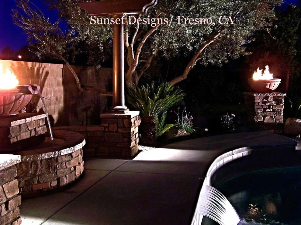 Exterior Fire Pits by Sunset Construction & Design - Photo 14