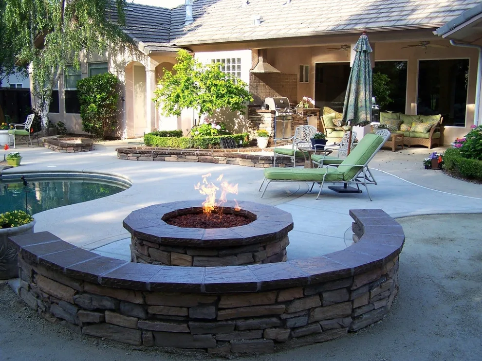 Exterior Fire Pits by Sunset Construction & Design - Photo 22