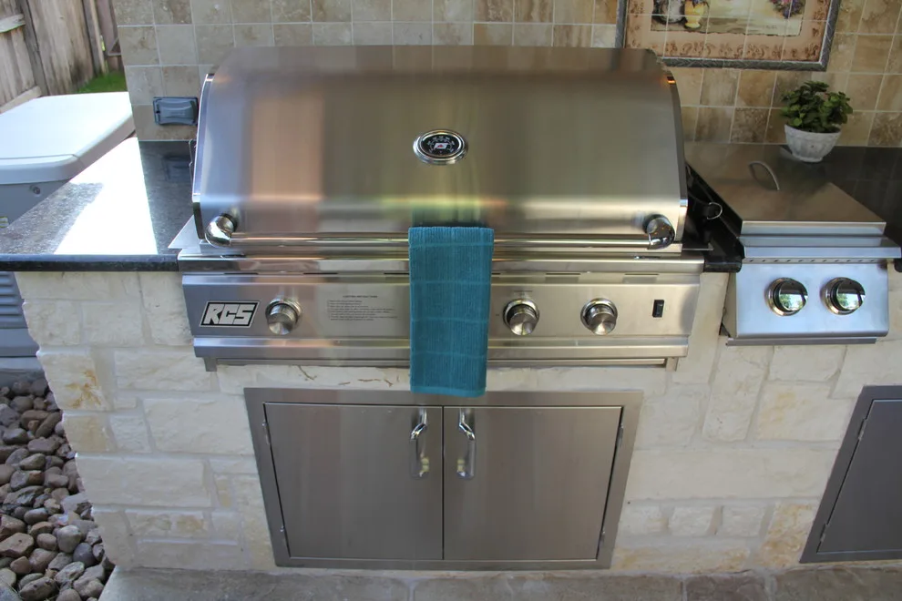 Humble, TX Outdoor Kitchen and Fire Pit by Tradition Outdoor Living - Photo 12