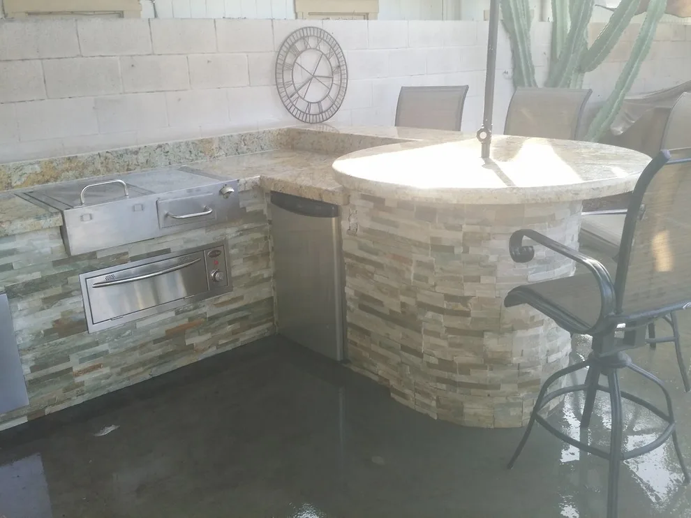 Alfresco Dining Area with Circular Table by L.A. Custom Grill Islands - Photo 6