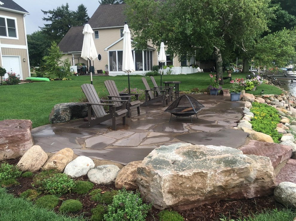Backyard Patio Installation Kalamazoo, MI by Platinum Ponds & Landscaping - Photo 2