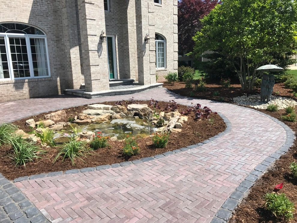 Koi Pond and Paver Patio Muskegon MI by Platinum Ponds & Landscaping - Photo 18