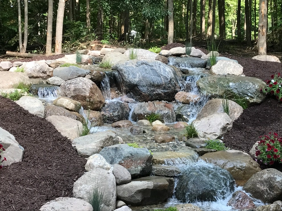Large Pondless Water Feature Installation Grand Rapids, MI by Platinum Ponds & Landscaping - Photo 2