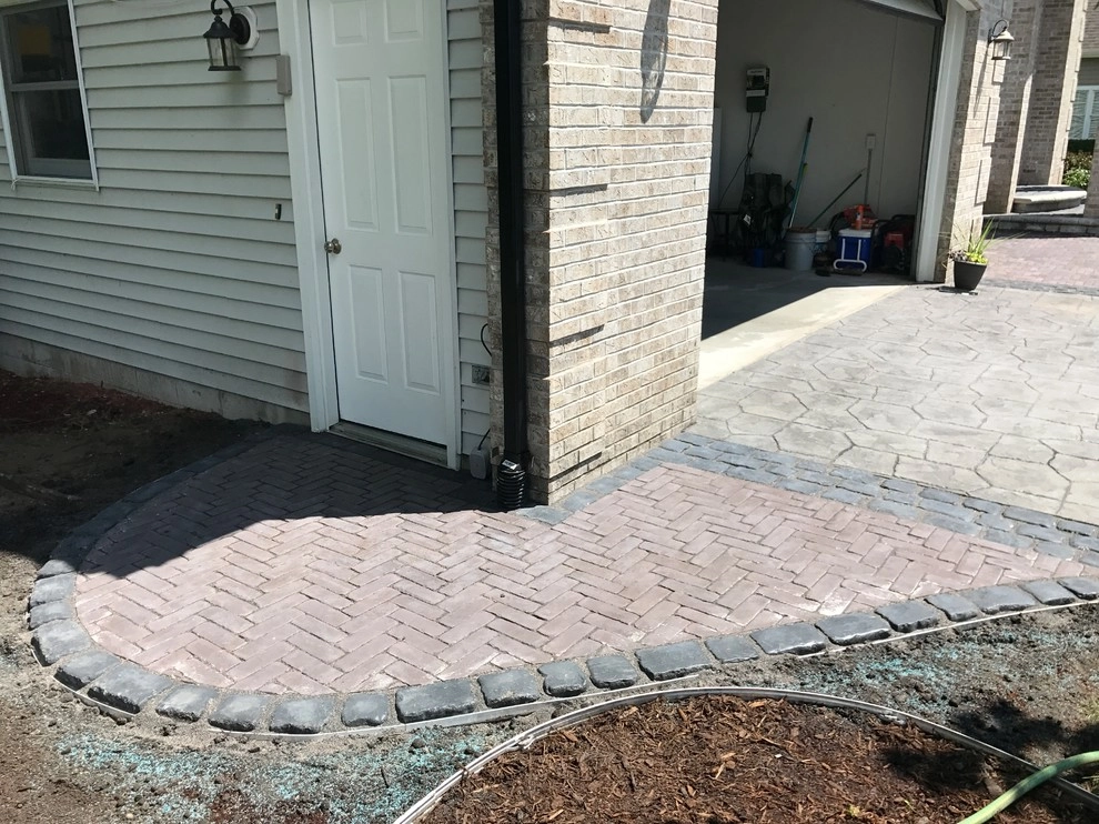 Koi Pond and Paver Patio Muskegon MI by Platinum Ponds & Landscaping - Photo 22