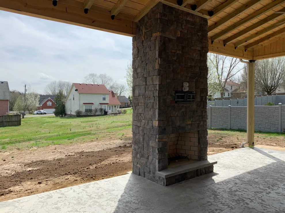Patio with Fireplace and Shed Roof by Epoch Construction LLC - Photo 6
