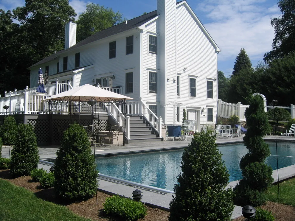Expansive multi-tiered deck leading to pool by American Deck Company - Photo 3