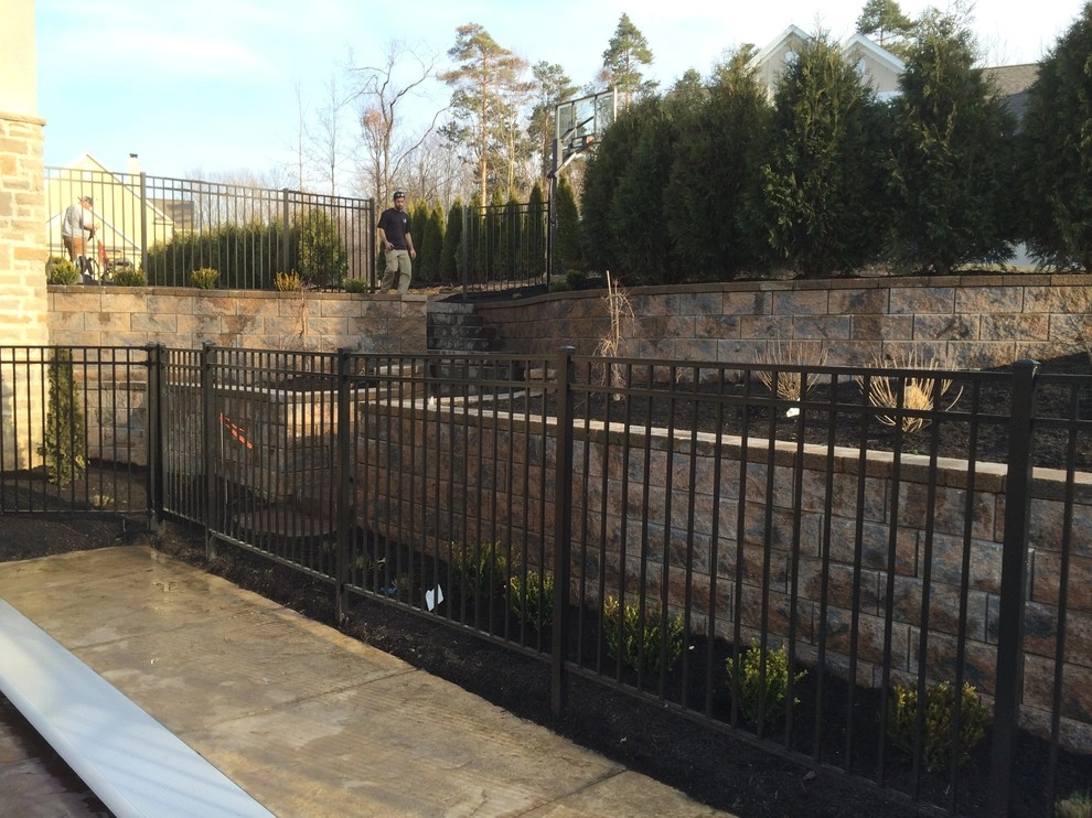 Tiered Structural Retaining Walls and Staircase by Pony Lawncare And Landscaping - Photo 9