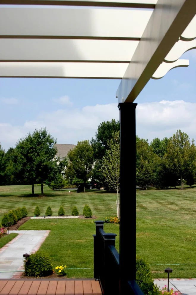 Wooden Tech Deck with Intex Pergola and Bluestone Patio by Miles Deck Construction - Photo 3