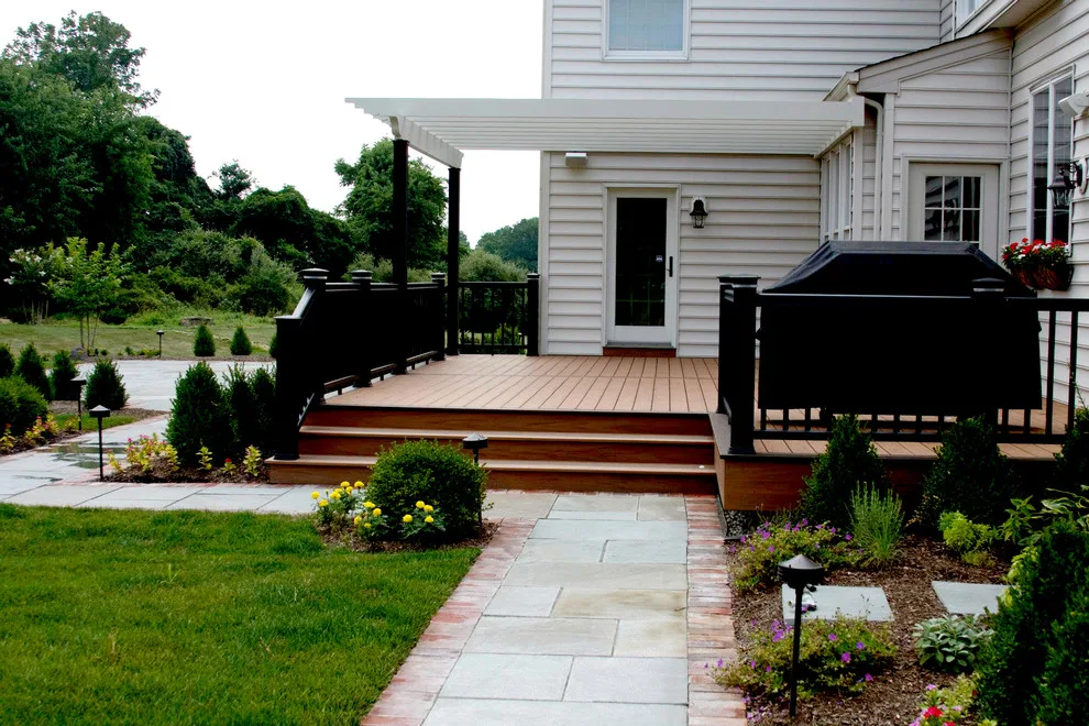 Wooden Tech Deck with Intex Pergola and Bluestone Patio by Miles Deck Construction - Photo 2