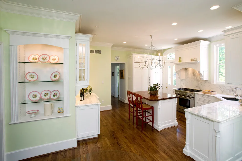 Classic White Cabinets with Marble Surfaces by Hyde Park Lumber & Design - Photo 6