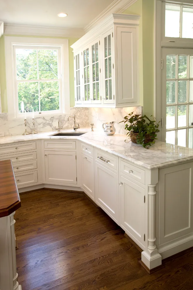 Classic White Cabinets with Marble Surfaces by Hyde Park Lumber & Design - Photo 2