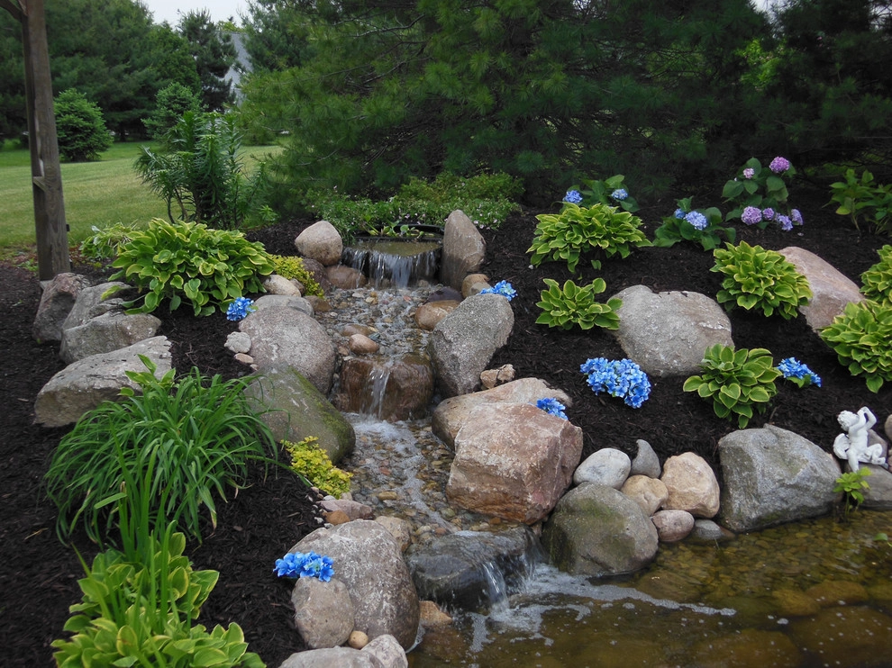 Bubacz Project, pondless waterfall, pond, landscaping, hydrangeas, field stone by Premiere Aquascapes - Photo 5