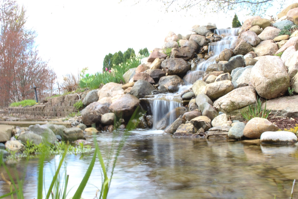 Greenwalt Waterfall, native field stone, natural elements and custom landscape by Premiere Aquascapes - Photo 7