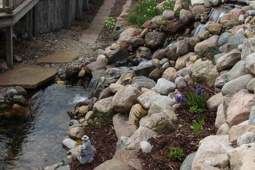 Greenwalt Waterfall, native field stone, natural elements and custom landscape by Premiere Aquascapes - Photo 3