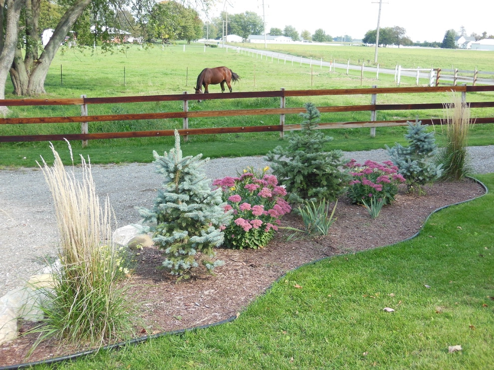 Beachy Property Landscaping, decorative grasses, driveway borders, edging by Premiere Aquascapes - Photo 2