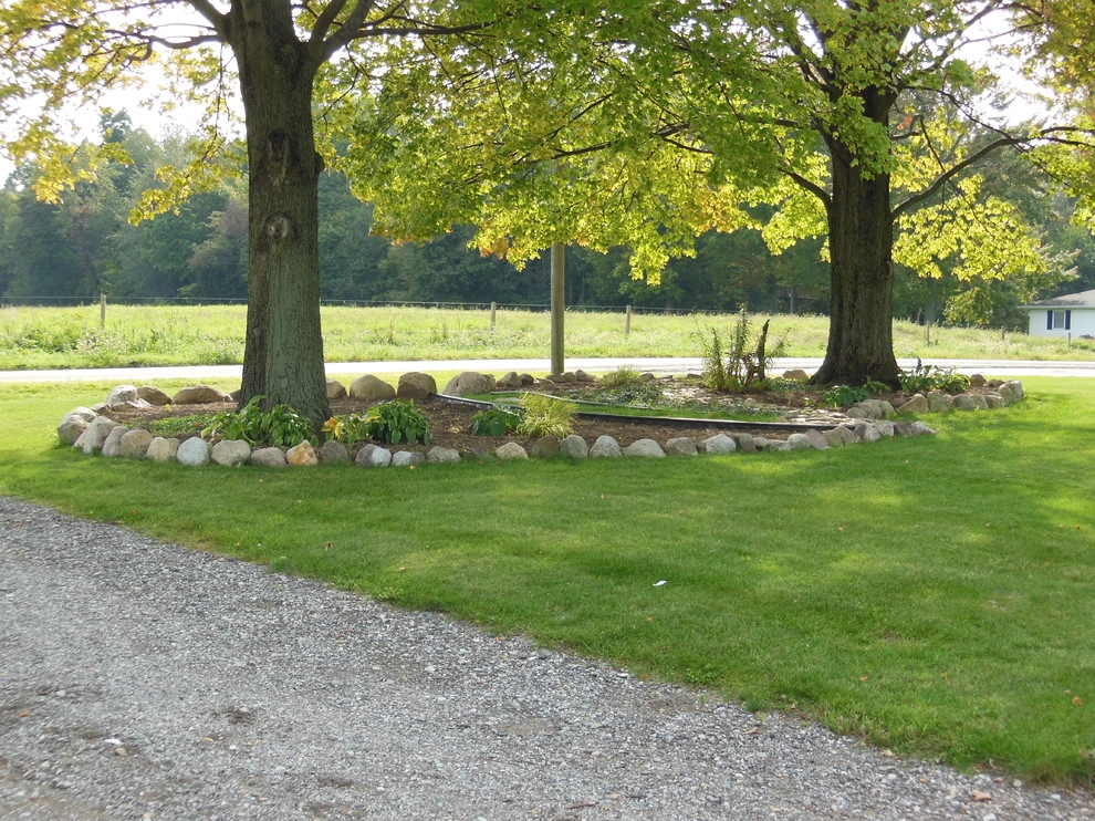 Beachy Property Landscaping, decorative grasses, driveway borders, edging by Premiere Aquascapes - Photo 3