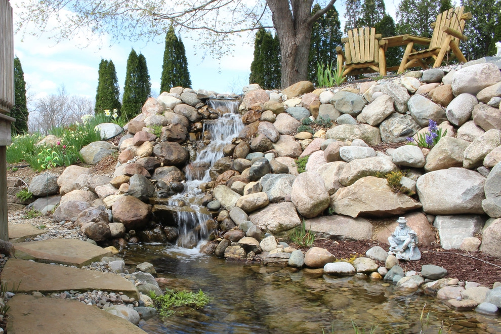 Greenwalt Waterfall, native field stone, natural elements and custom landscape by Premiere Aquascapes - Photo 6