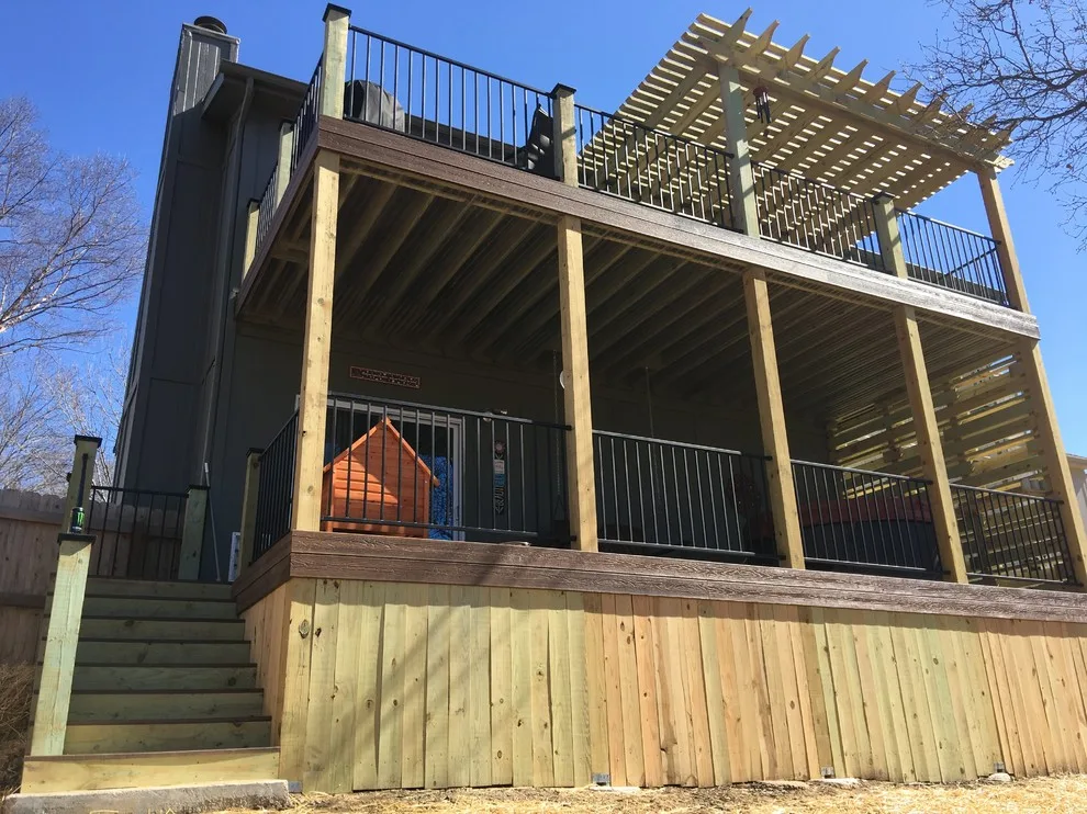 Two-Level Composite Deck Featuring Pergola and Privacy Wall by The Deck Pro - Photo 2