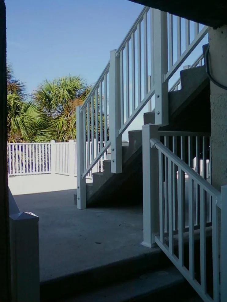 VINYL BARRIERS by Signature Decks & Fences - Photo 11