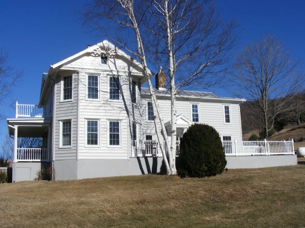 Vinyl Cladding by Heartland Home Improvements LLC - Photo 6