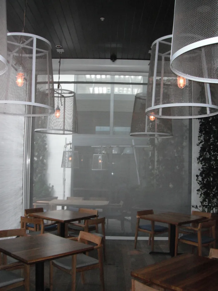 W-Hotel South Beach - Dutch Restaurant Wind Mitigation Screens at 95% by Sentinel Retractable Screens, LLC - Photo 23