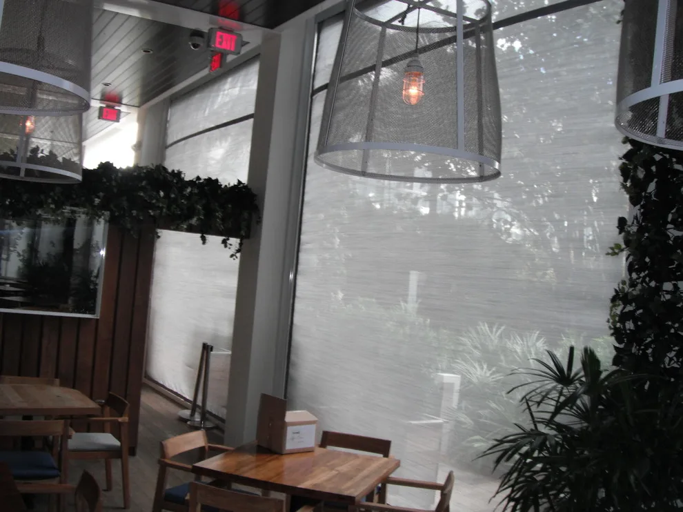 W-Hotel South Beach - Dutch Restaurant Wind Mitigation Screens at 95% by Sentinel Retractable Screens, LLC - Photo 2