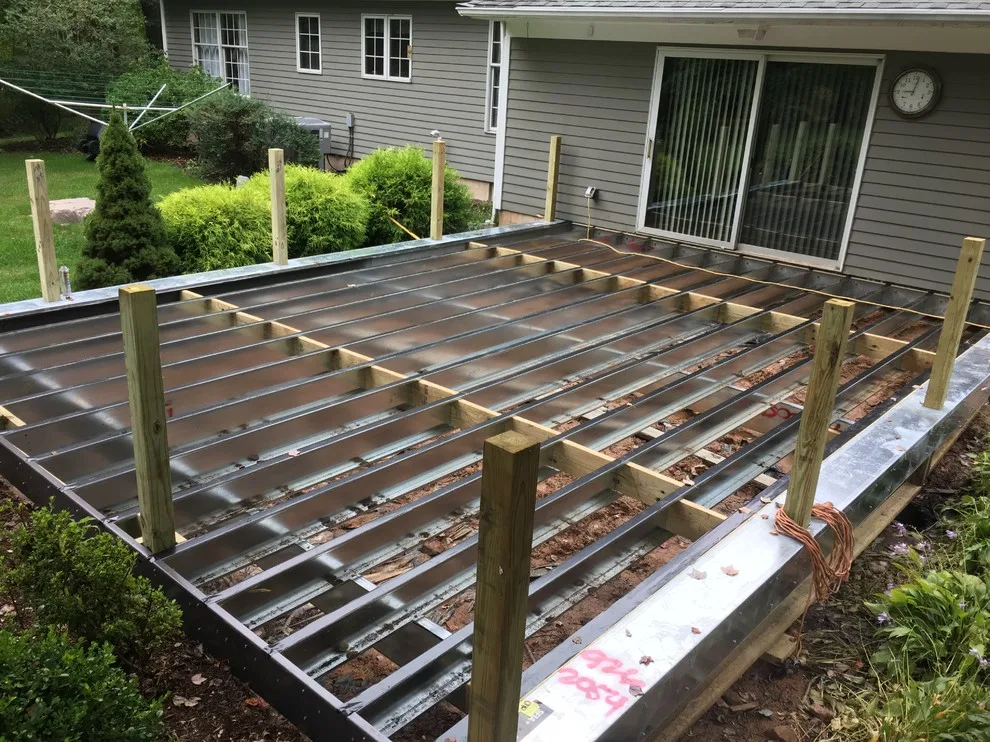 Zuri Brazila Deck Featuring White Trex Railing by Miles Deck Construction - Photo 8