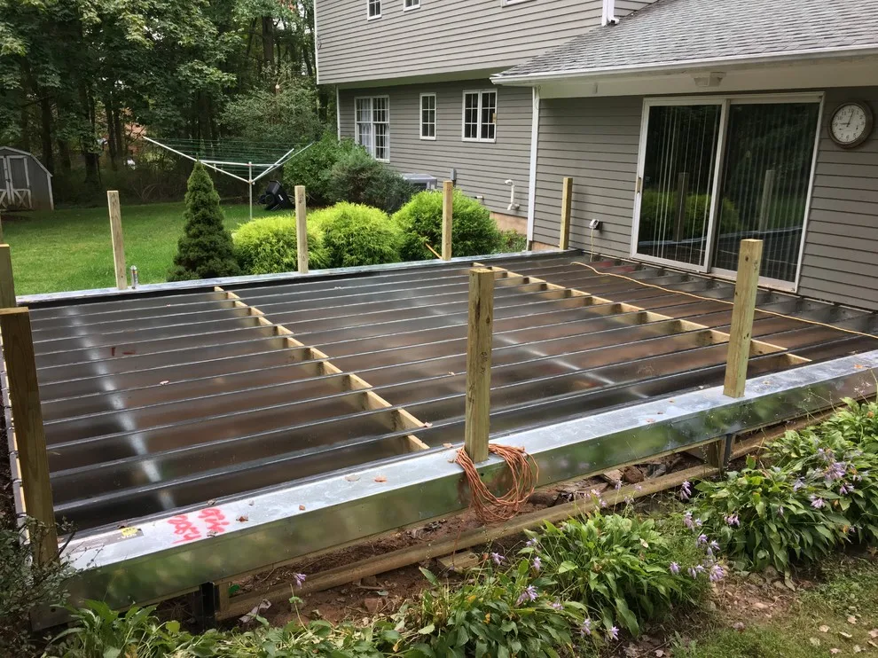 Zuri Brazila Deck Featuring White Trex Railing by Miles Deck Construction - Photo 6