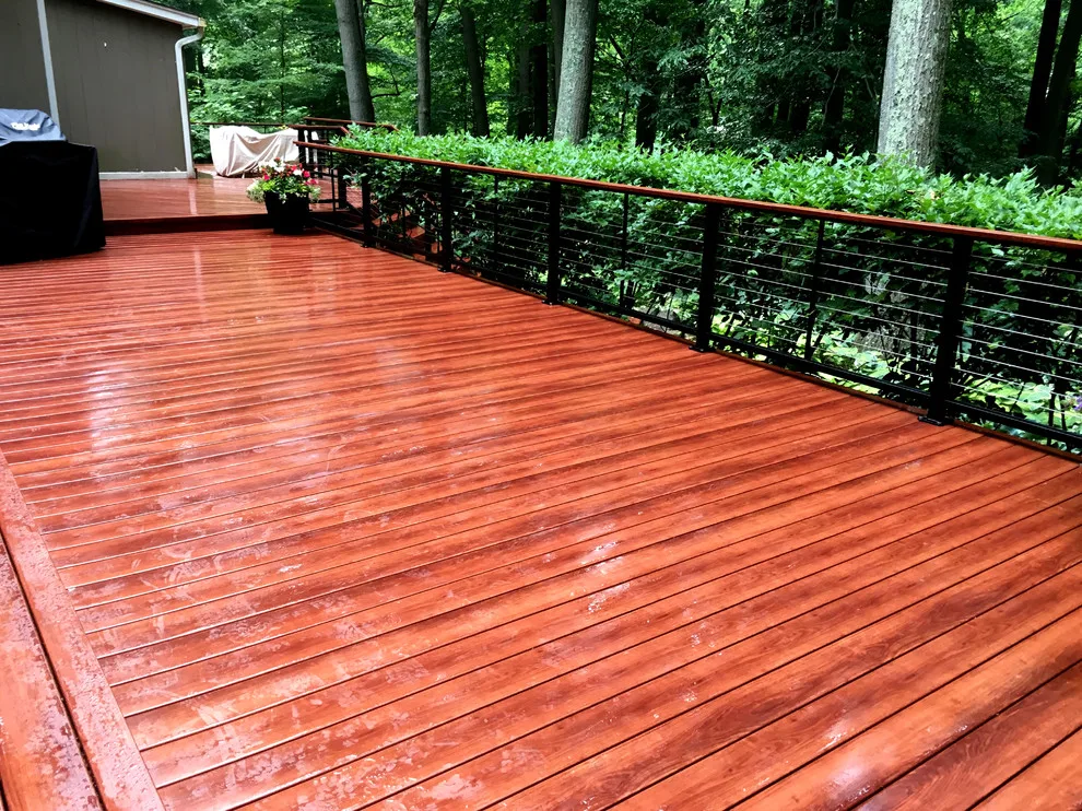 Zuri patio featuring Feeney cable railing by Miles Deck Construction - Photo 3