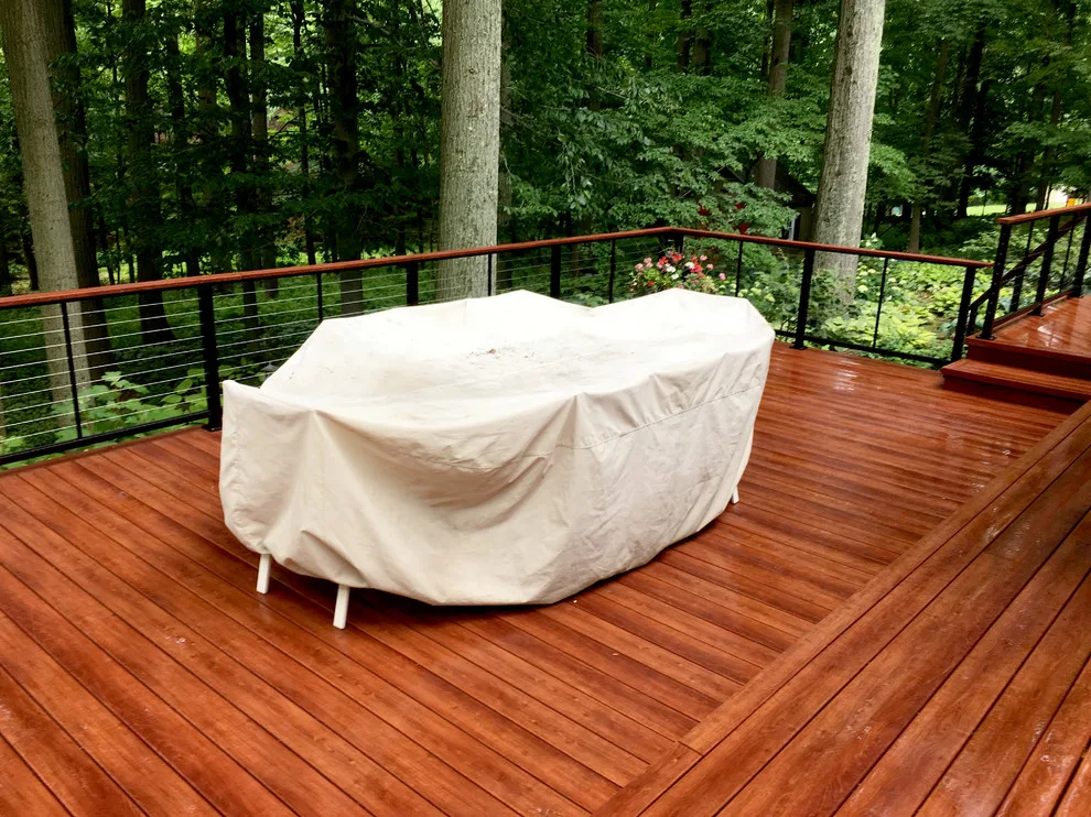 Zuri patio featuring Feeney cable railing by Miles Deck Construction - Photo 7